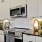 modern tile backsplash and stainless steel appliance